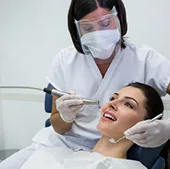 Dentist treating a relaxed patient
