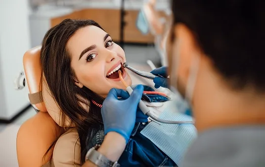 Patient smiling in the dental chair