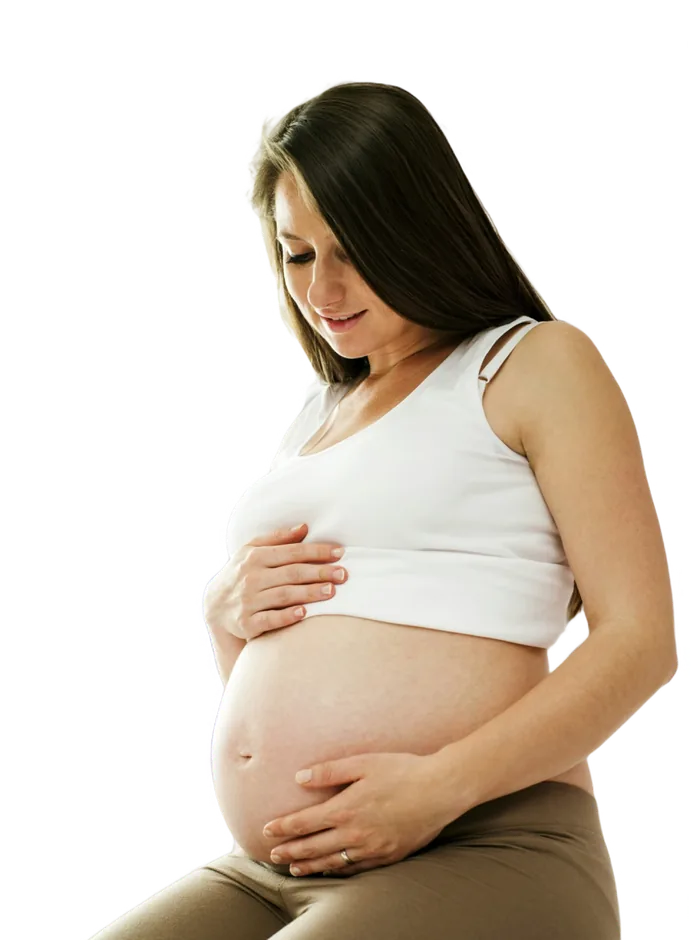 Pregnant woman resting a hand on her bump
