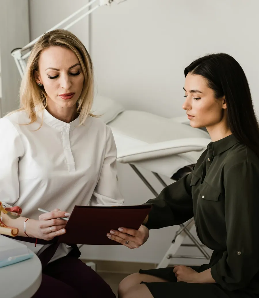 Gynecologist talking with a patient
